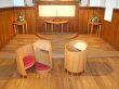 "Scoop" Priests Chair and Kneeler pods with Communion Table and Flowerstands